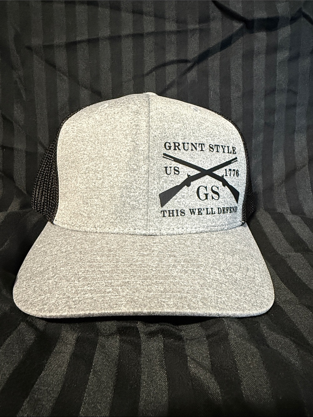 Grunt Style Gray Front Black Mesh Trucker Hat with Crossed Rifles